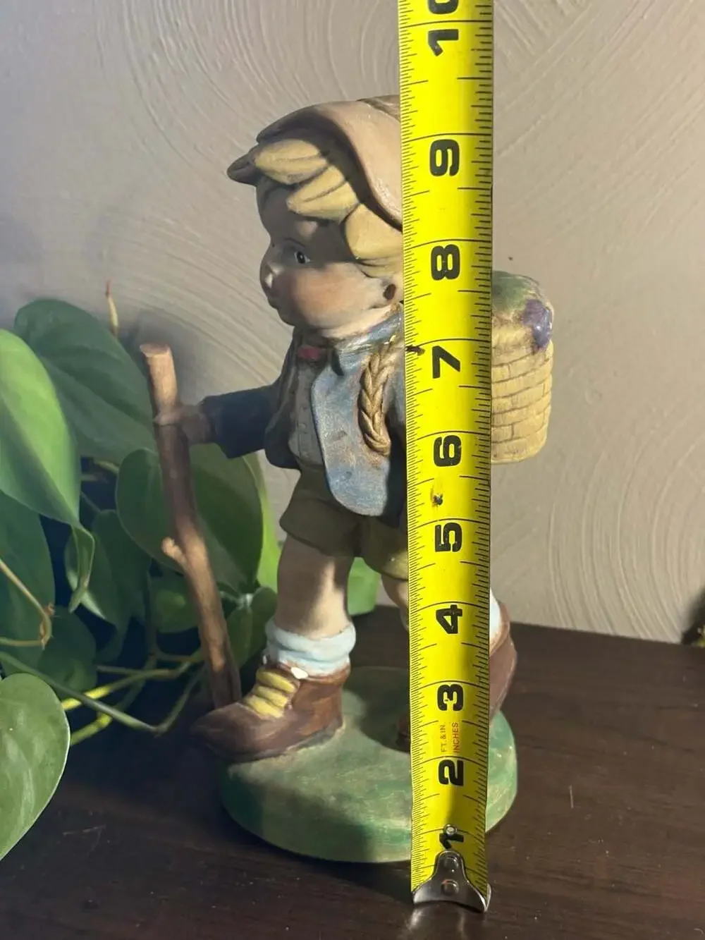 Vintage 9-inch Chalkware Boy with Walking Stick and Grape Basket Figurine